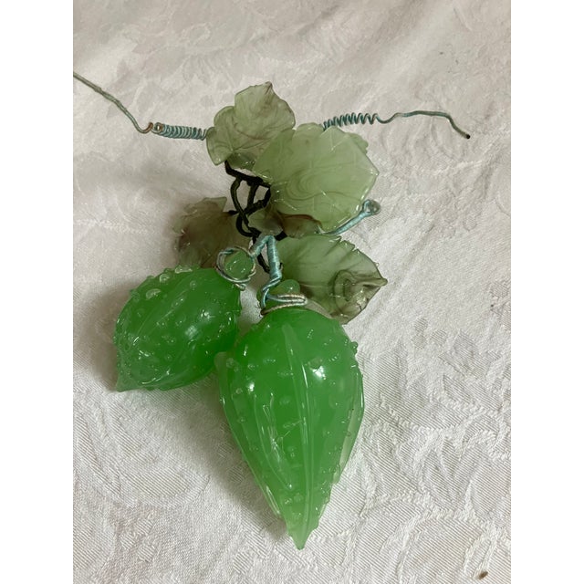 Charming 1950's Italian glass grapes and leaves. The pair of grapes are a mint green color attached by hand to branch with...