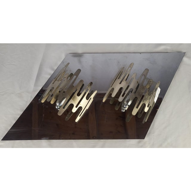Designer: Angelo Gaetano Dims.: 37"W x 4"D x 20"H Origin: Italy Circa: 1960's Exceptional, rare, and large wall light in...