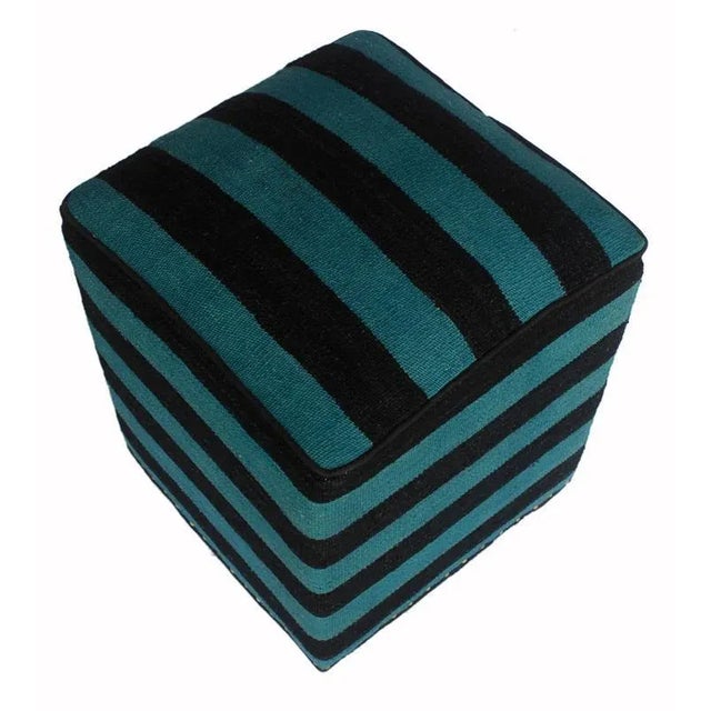 Chic handmade ottoman crafted using wood and upholstered using hand-woven kilim wool rug is a multi-purpose fashion pouf...