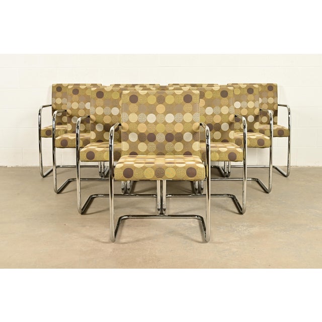 An exceptional set of ten Mid-Century Modern "Brno" style tubular cantilever lounge chairs or club chairs In the manner of...