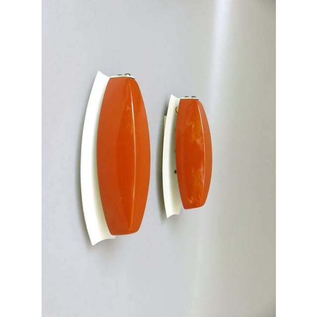 A few extraordinary and rare wall lights from Kaiser Leuchten from the 1960s. The unusual design is already all about...