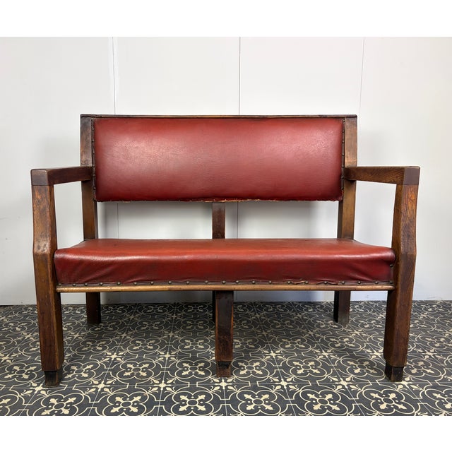 This striking early-to-mid 20th-century institutional public bench carries a powerful sense of history. Originally...