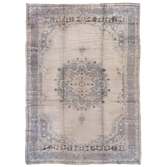 an early 20th Century Oushak room-size rug Details rug no. 10080 size 9' 3" x 13' 3" (282 x 404 cm)