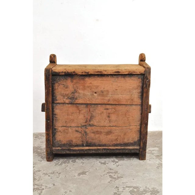 This heavy antique chest comes from the Himalayas and was made by Indian craftsmen with sturdy, visible mortise and tenon...