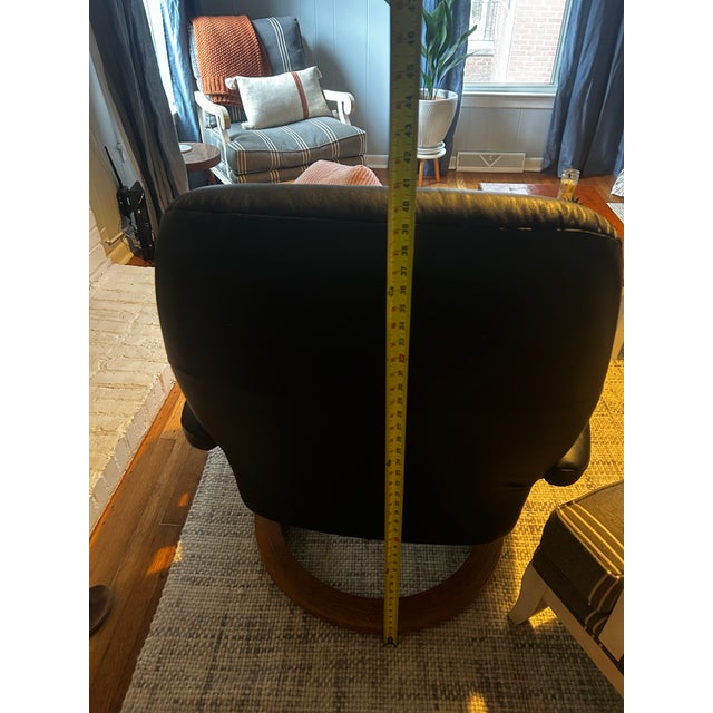 Ekornes Stressless Black Leather Recliner and Ottoman With Wood Base For Sale - Image 10 of 13