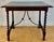 19th Spanish side table with cared Solomonic turned legs and iron stretcher. The top has a carved edges and a beautiful...