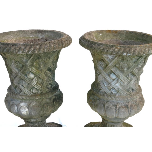 Vintage Large Concrete Garden Urns With Floral Rosetta Relief and Tudor Weave Design- A Pair For Sale - Image 9 of 13