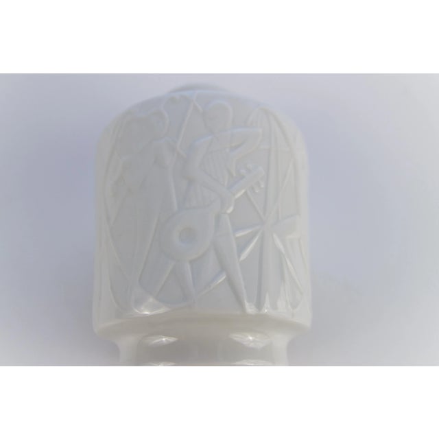 Beautiful shaped Mid-Century Vintage White Porcelain Vase “Paradise” with very interesting relief decor - a representation...