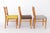 Set of four vintage dining chairs made of solid beechwood, dating from the 1950s–1960s. Manufacturer unknown, most likely...
