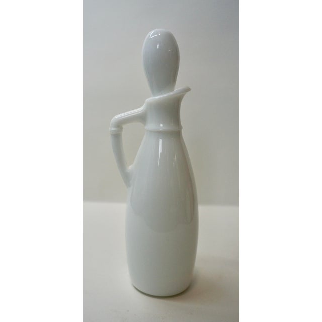 A charming piece of Americana for a vintage kitchen or cottagecore display. This Federal Glass "Rosecrest" cruet features...