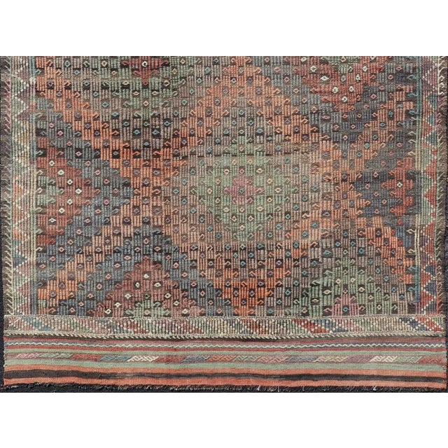 Textile Mid 20th Century Mid 20th Century Softly Colored Turkish Vintage Embroidered Kilim Rug With Multi Layered Diamond For Sale - Image 7 of 11