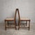 Details * Pair of dining chairs * Circa 1950s * Solid oak construction * Traditional slatted backs * Turned front legs *...