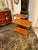The product is a stylish pair of Italian bagues style side tables, made of brass and leather. The combination of brass and...