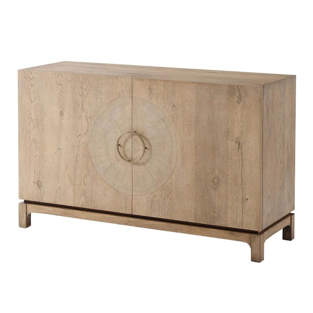 Mid Century style cabinet with reclaimed Oak veneers and restored chestnut burl, an aged Oak finish with brass handles....