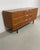 A vintage Danish teak sideboard from the 1950s with drawers and an elegant horizontal design, perfect for a functional and...