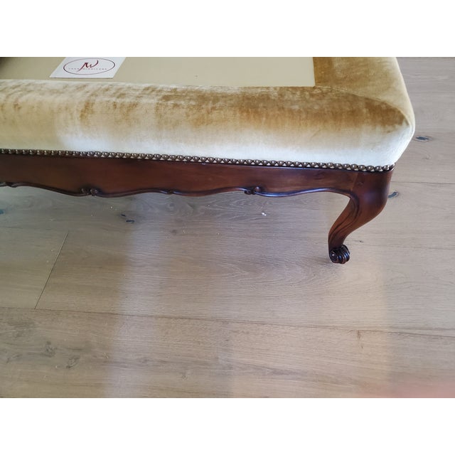 Features a beautifully multi-scalloped carved solid mahogany base frame, six classic cabriole legs ending in pad feet, and...