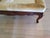 Features a beautifully multi-scalloped carved solid mahogany base frame, six classic cabriole legs ending in pad feet, and...