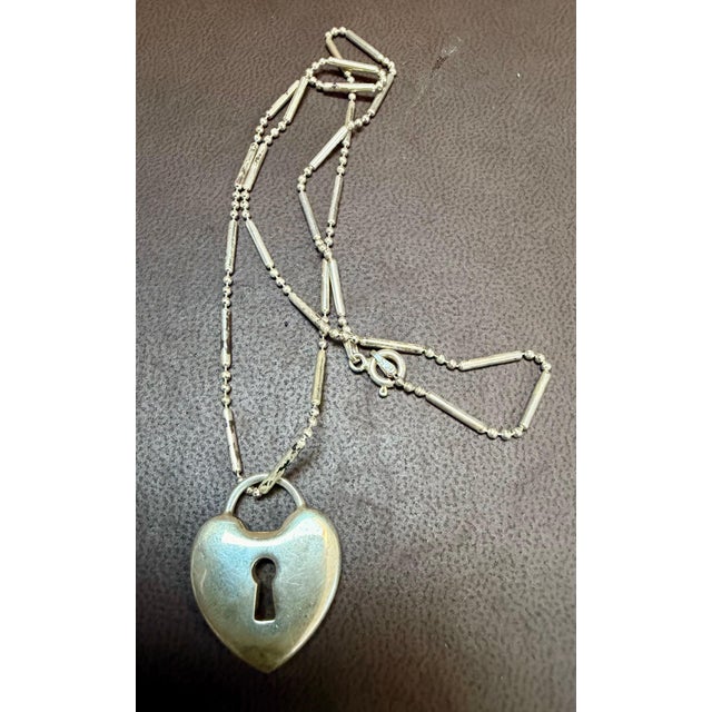 Tiffany &amp; Co. Sterling Silver Heart Tag Charm Necklace Tiffany &amp; Co. In Box An elite authentic Heart Lock from...