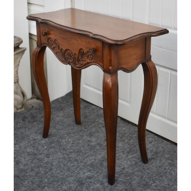 Vintage (1990's) Small Console/ Accent Table has an Italian Provincial Style. The Brand is Hekman. The Table is Wood....