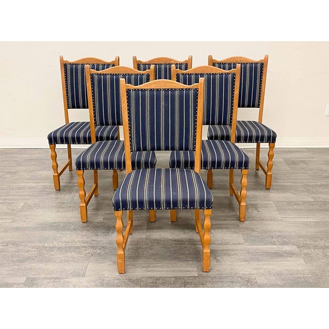 Set of 6 blue striped upholstered dining chairs with carved / figured oak frames. The chairs have a very pleasant and...