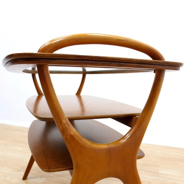 A very and striking butlers table/tray from the 1950s by Hans Olsen. With a beautifully shaped bentwood frame, the...
