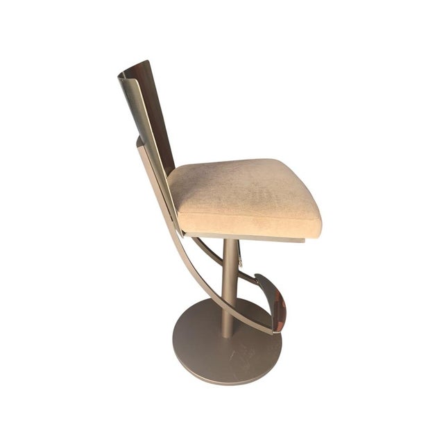 The Regal bar stool features contoured champagne back for long-term comfort, with a striking graphic cutout detail. It has...
