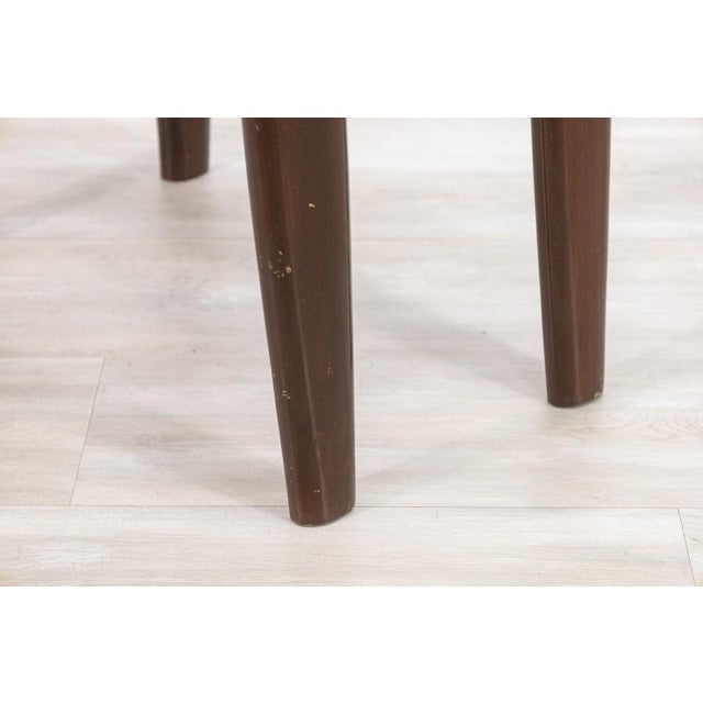 An stool by Angel Pazmino from Ecuador. This beautiful handmade stool features a leather strapped seat with incredible...