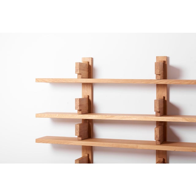 B17 Bibliothèque Wall Unit Shelf by Pierre Chapo in Oak, France. This piece is attributed to the mentioned designer/maker....
