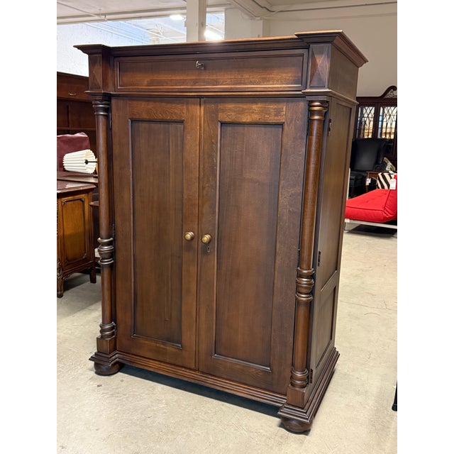 Design Plus Gallery presents a Media Armoire from Polo x Ralph Lauren. The dark wood cabinet is great for keeping your...