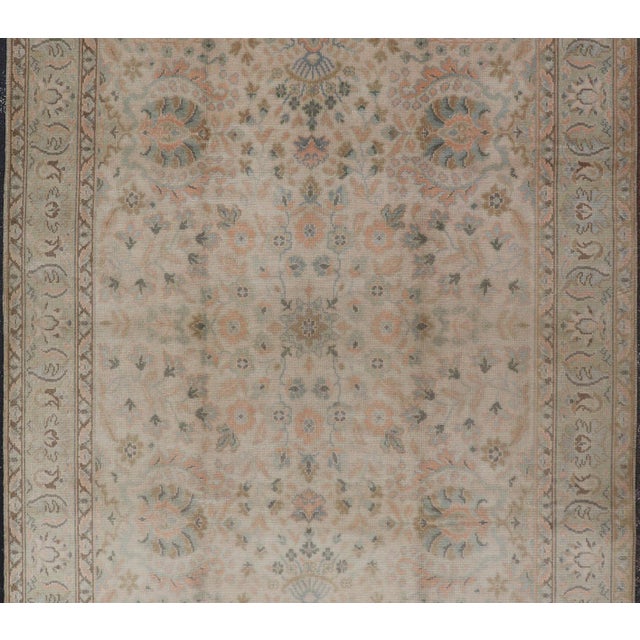 Tribal Neutral Vintage Turkish Oushak Rug With Floral Design and Repeated Floral Motifs For Sale - Image 3 of 16