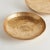 This pair of handcrafted bowls has simple round silhouettes, with a matte finish and subtle texture. They can be styled...