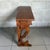 Elegant and versatile solid wood console table with a central drawer and lyre-shaped legs, a solid piece of cabinetry...