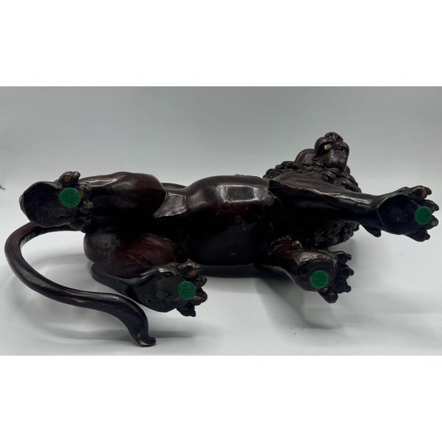 Exceptional matched pair of large antique cast bronze lion sculptures, likely Italian or French, dating to the late 19th...