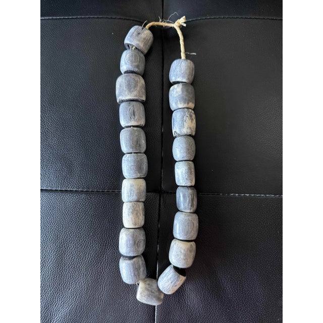 Beautiful vintage strand of hand-carved bone beads with a wonderfully aged, weathered appearance. The beads have an...