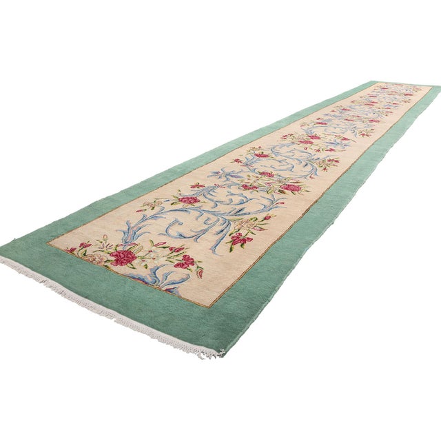 61367 Signed Vintage Persian Kerman Rug Runner, 03'03 x 19'09. This hand-knotted wool vintage Persian Kerman rug runner,...