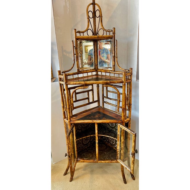 Just in this exceptional French Napoleon III Rare Bamboo & Lacquer Corner Cabinet, C.1870-1890. This corner cabinet las...
