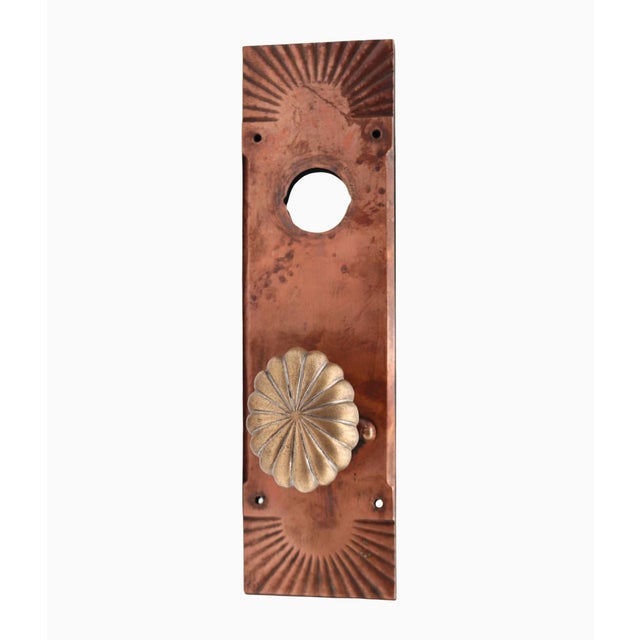 Vintage radial sunburst door knob set made of bronze with a copper finish and polished bronze finish. The original...