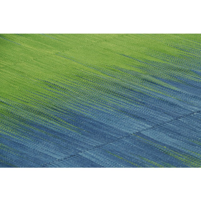 Handwoven in wool, this 7x9 Kilim is from an inventive new contemporary flat weave collection by Rug & Kilim. On the...