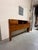 Mid-Century Modern Franklin Shockey full size sculpted pine wood storage bed headboard. Item features 2 sliding doors,...