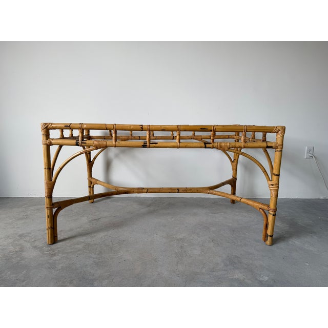 Beautiful 1970s Dal Vera Italian dining table crafted from natural rattan and bamboo, showcasing the brand’s signature...
