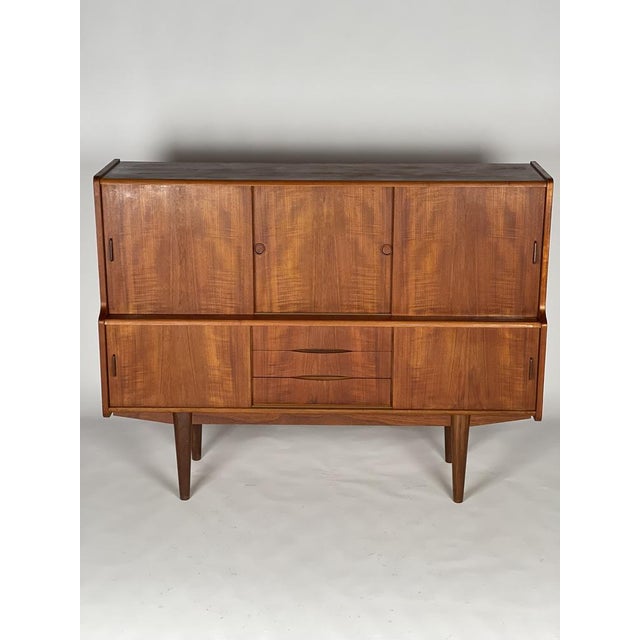 Tall Danish Teak Sideboard, 1960s, in Very Good conditions. Designed 1960 to 1969
