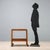 1950s service trolley featuring a refined solid wood and oak veneer structure. It boasts a functional double-tier design...