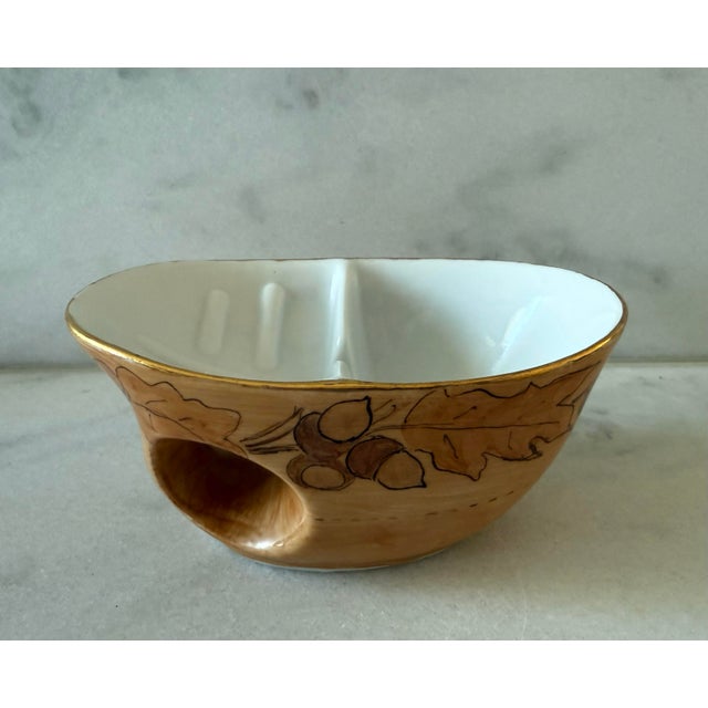 Vintage porcelain shaving scuttle mug with a built-in partition or deck with a perforated drain area on one side. The...