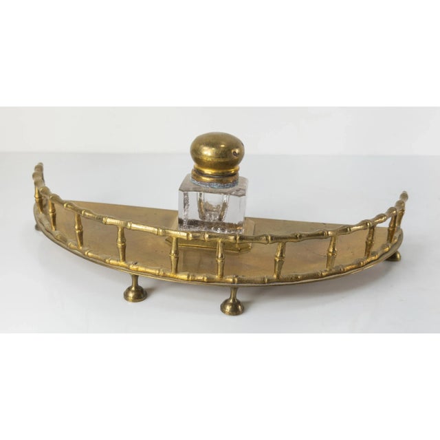 We are selling this great brass or bronze inkwell with Faux bamboo gallery. This simple desk set is probably English or...