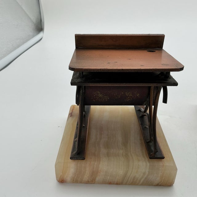 Rare and highly collectible pair of 1972 C. Jeré school desk bookends, signed by the artist and produced by Artisan House....