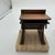 Rare and highly collectible pair of 1972 C. Jeré school desk bookends, signed by the artist and produced by Artisan House....