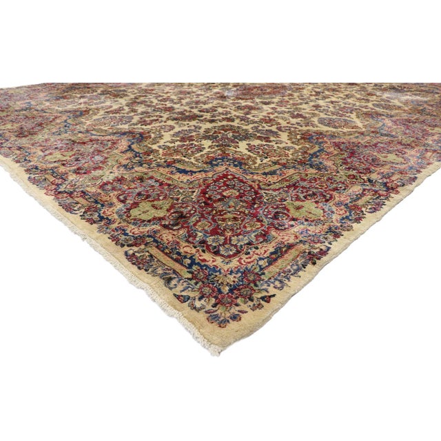 Antique Persian Kerman rug with French Victorian Style, Antique Kirman Rug 12’01 x 15’11. With an impressive array of...