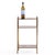 The table features a refined brass frame with neoclassical detailing and three tiers of inset mottled glass shelves,...