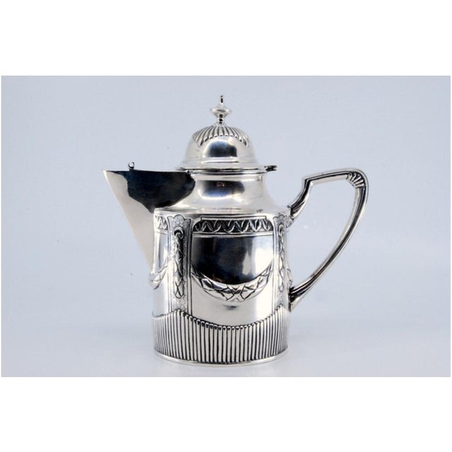 Fluted Silver Teapot with Scrolls and Garlands, in Good conditions. Designed 1920 to 1949