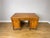 An elegant Vintage French Louis oak desk cabinet featuring a broad rectangular top, decorative carved detailing, two side...